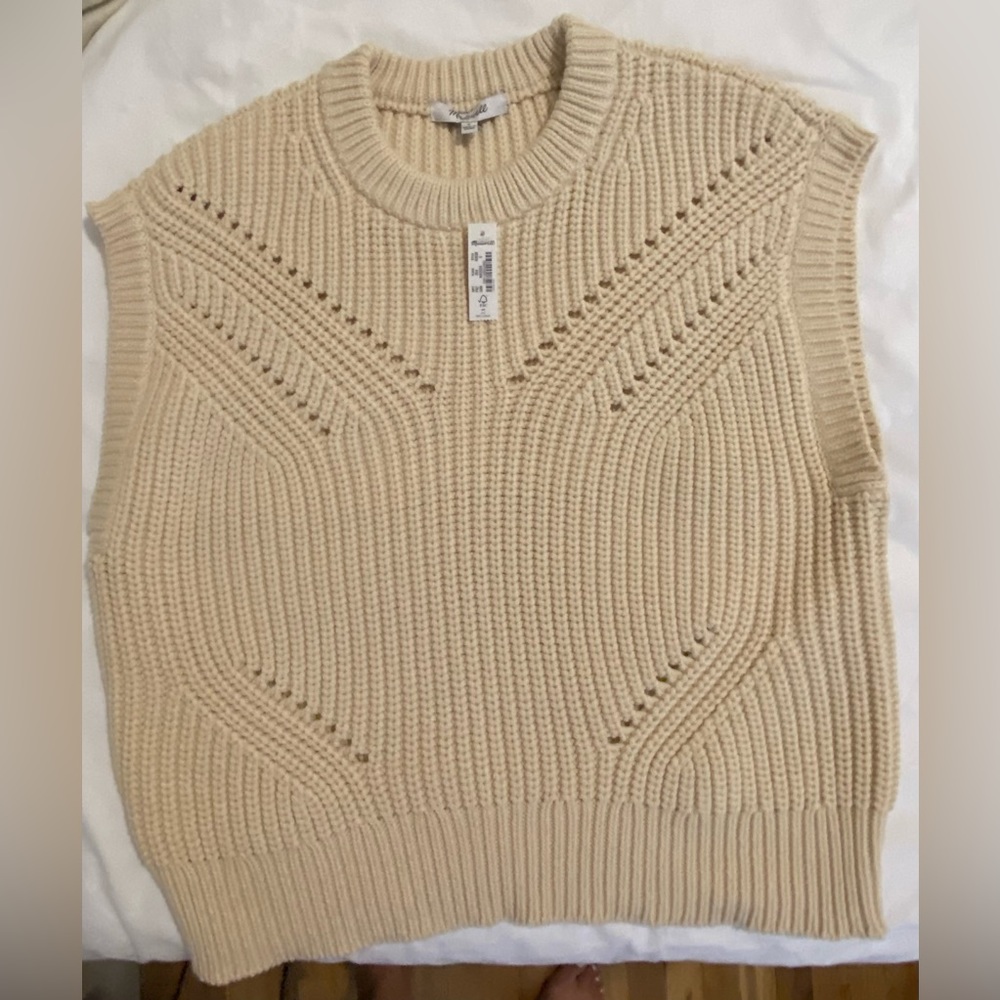 Brand new cream color knitted vest.
